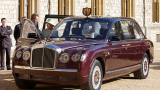WINDSOR, UNITED KINGDOM - MAY 29:  Queen Elizabeth II Inspecting The New Bentley State Limousine Car Presented To Her As A Golden Jubilee Gift On Behalf Of A Consortium Of British-based Automotive Manufacturing And Service Companies.  The Car Has Been Fully Fitted To Withstand Terrorist Attacks.  The Queen Is The Only Person Permitted To Have A Car On British Roads Without A Registration Number Plate.  (Photo by Tim Graham Photo Library via Getty Images)